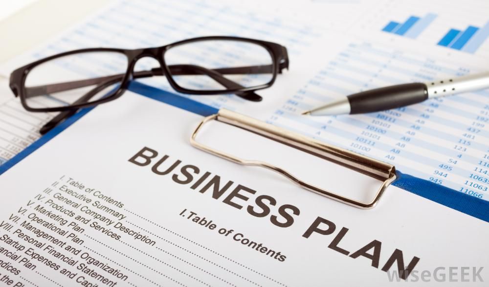 business-plan-with-glasses-and-pen