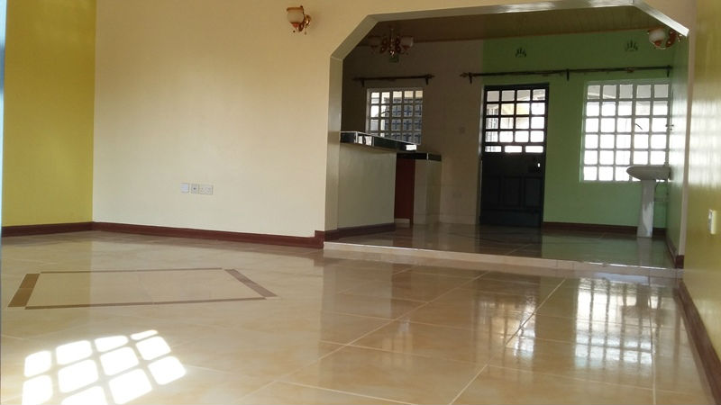 Spacious lounge and dinning area with natural light, superb paintwork and high quality tiles
