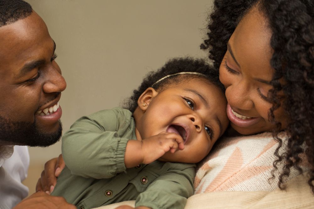 photo-black-couple-baby-laughing